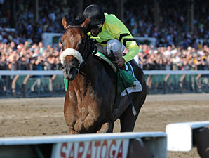 A Little Warm wins the 2010 Jim Dandy.