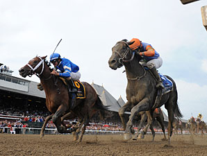 Alpha and Golden Ticket deadheat in the 2012 Travers.