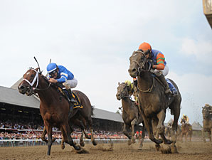Alpha and Golden Ticket deadheat in the 2012 Travers.