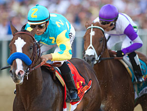 Bodemeister leads I'll Have Another during Preakness 137.