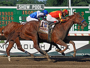 Coil wins the Haskell Invitational.
