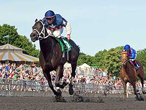 Fire Tricks wins the 2014 Isaac Murphy Handicap (via DQ).