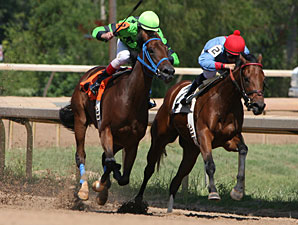 Foreign Girl (left) wins the 2011 LA Stallion Stakes Filly Division.