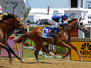 Haywired with Mary Russ Tortora wins the 2013 Lady Legends Race at Pimlico.