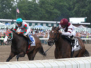 Indian Spell (right) wins the 2013 Miss Woodford Stakes.