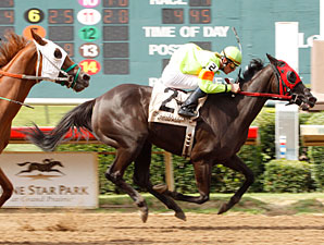 Joy's Paradise wins the 2011 Valor Farm Stakes.
