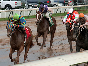 King Of The Bayou with Richard Eramia aboard outduels Heavenville and jockey Shane Sellers to win the Louisiana Cup Juvenile at Louisiana Downs.