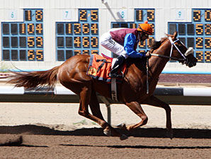 Lady Genius wins the 2013 C.O. Ken Kendrick Memorial Stakes.