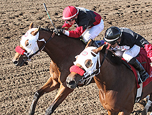 Native American and Grand Full Moon deadheat in the 2014 Shakopee Juvenile Stakes.