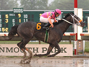 Smoldering Beauty wins a feature race at Belmont Park.
