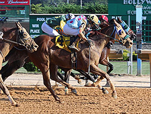 Strawberry Cupcake wins the 2014 Dr. Ernest Benner Handicap.