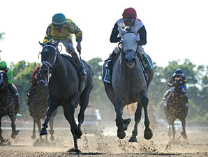 Zo Impressive wins the 2012 Mother Goose.