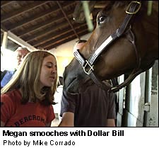 Megan smooches with Dollar Bill